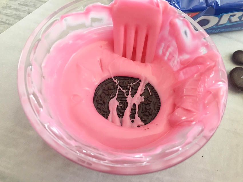 In a microwave safe dish, heat one cup of your pink candy melts on 50% power for 3 to 4 minutes, after 30 seconds until melted.