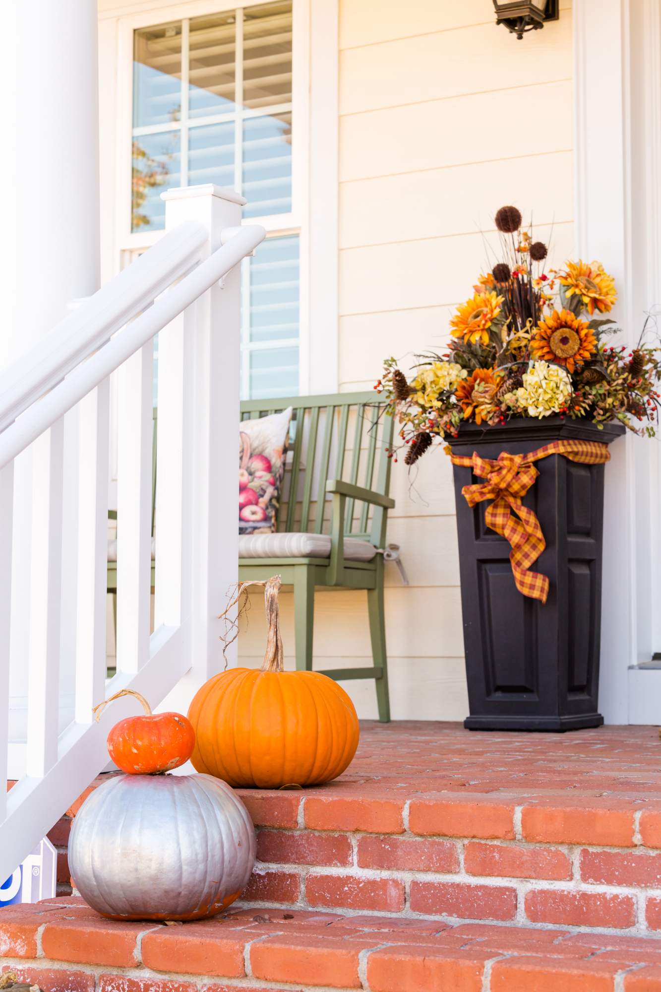 Fall Decor on Front Porch decorated for Halloween