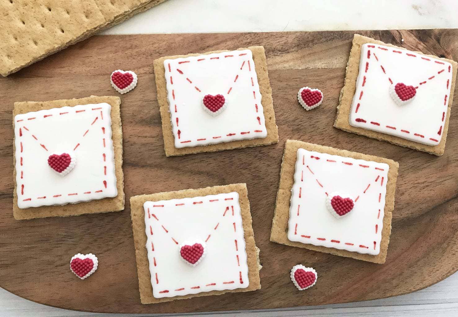 These Love Letter Cookies made with fondant are the perfect way to give someone a surprisingly sweet and edible Valentine's Day Card!  