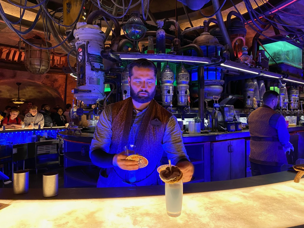 Oga's Cantina in Hollywood studios - Bartender serving up a delicious cocktail