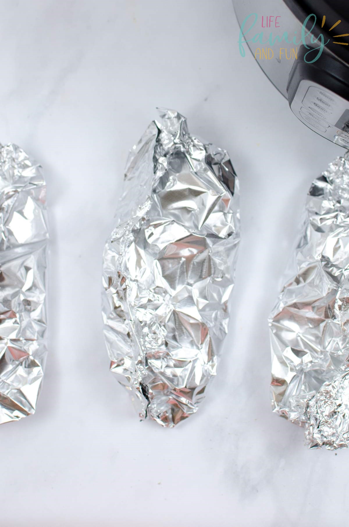 chicken breasts wrapped in foil