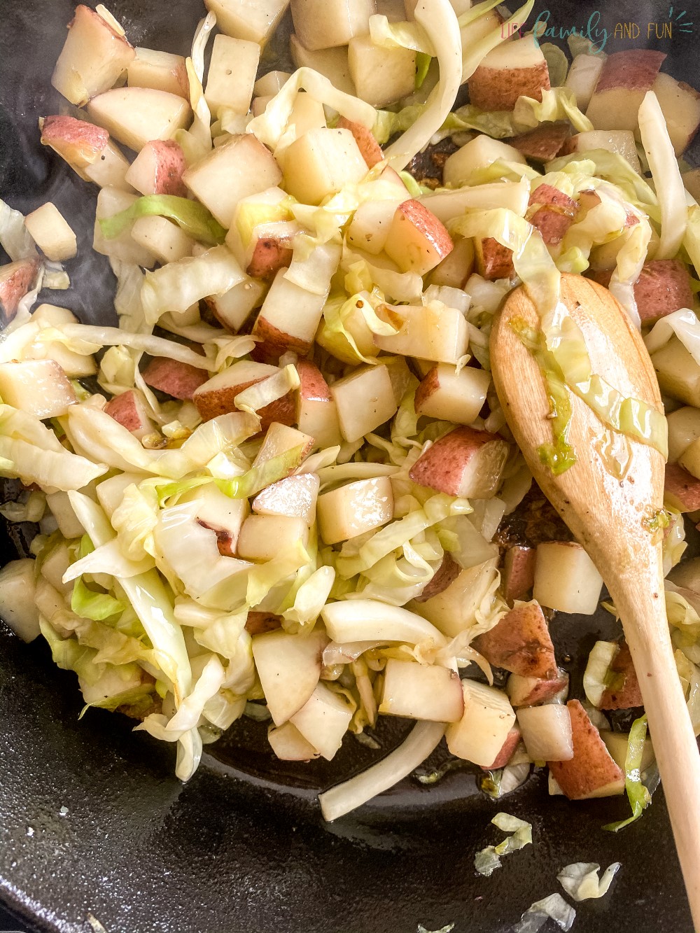sauteed cabbage and potatoes in skillet