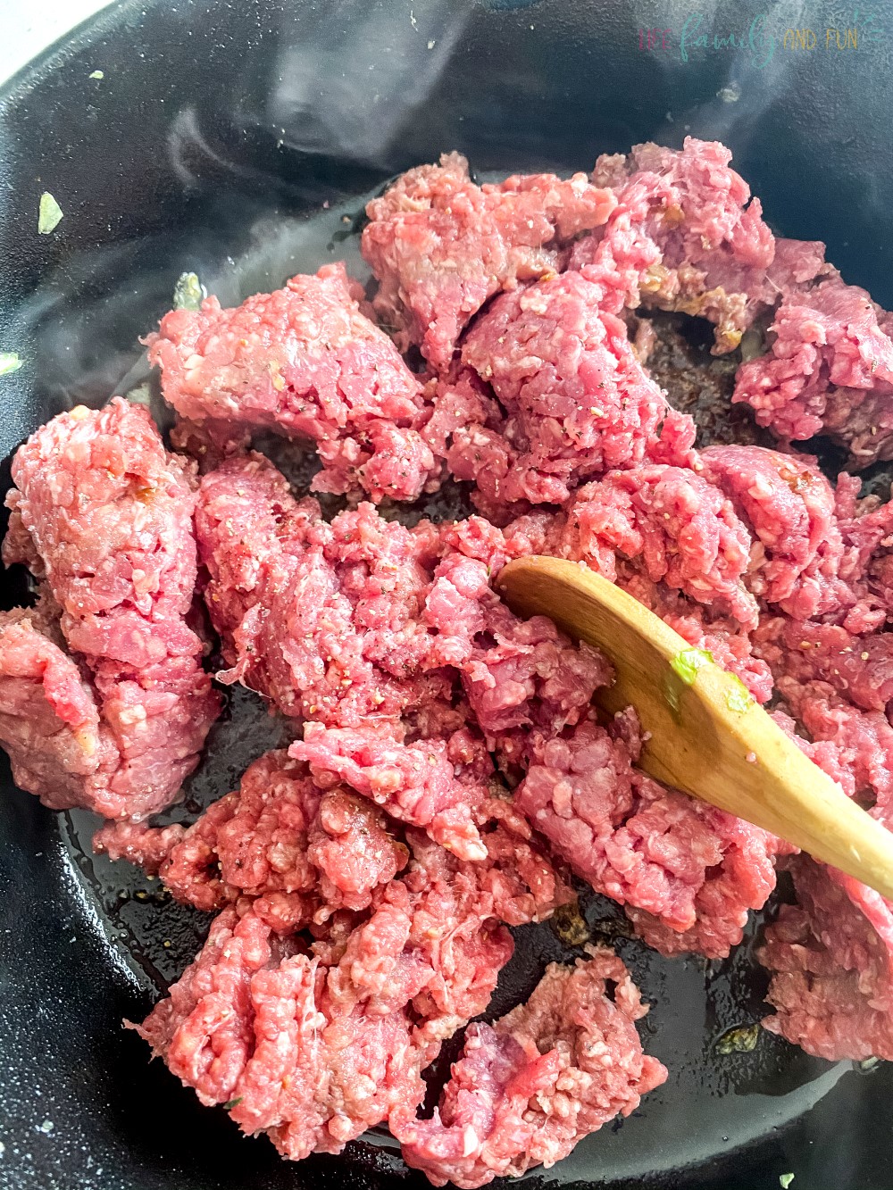 cooking hamburger beef in skillet
