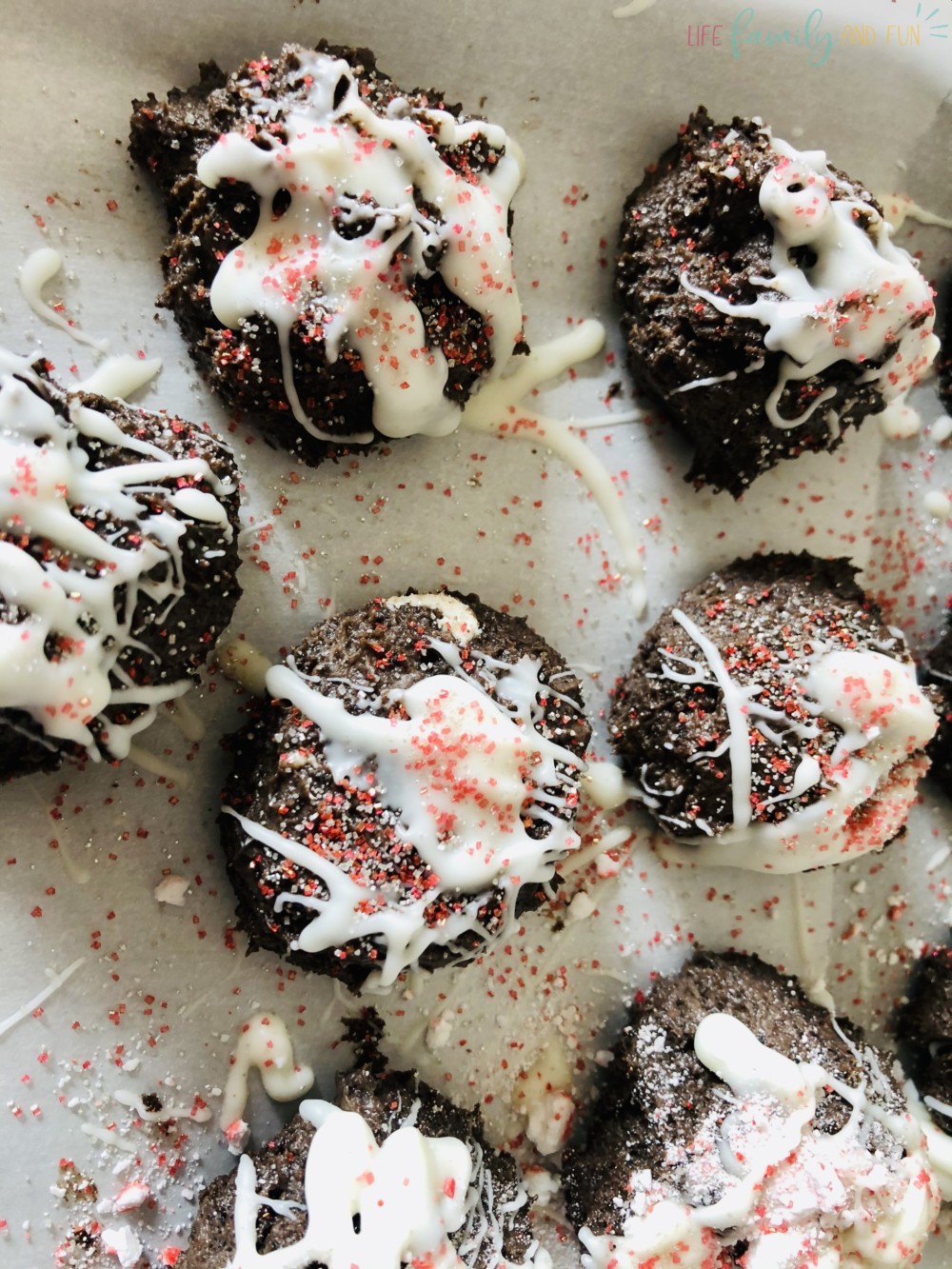 Oreo truffles with white chocolate drizzle and sprinkles
