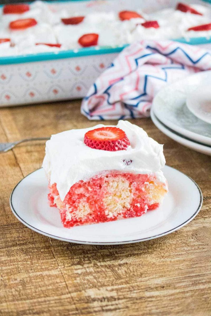 Poke Cake With Strawberry Jello and Cheesecake