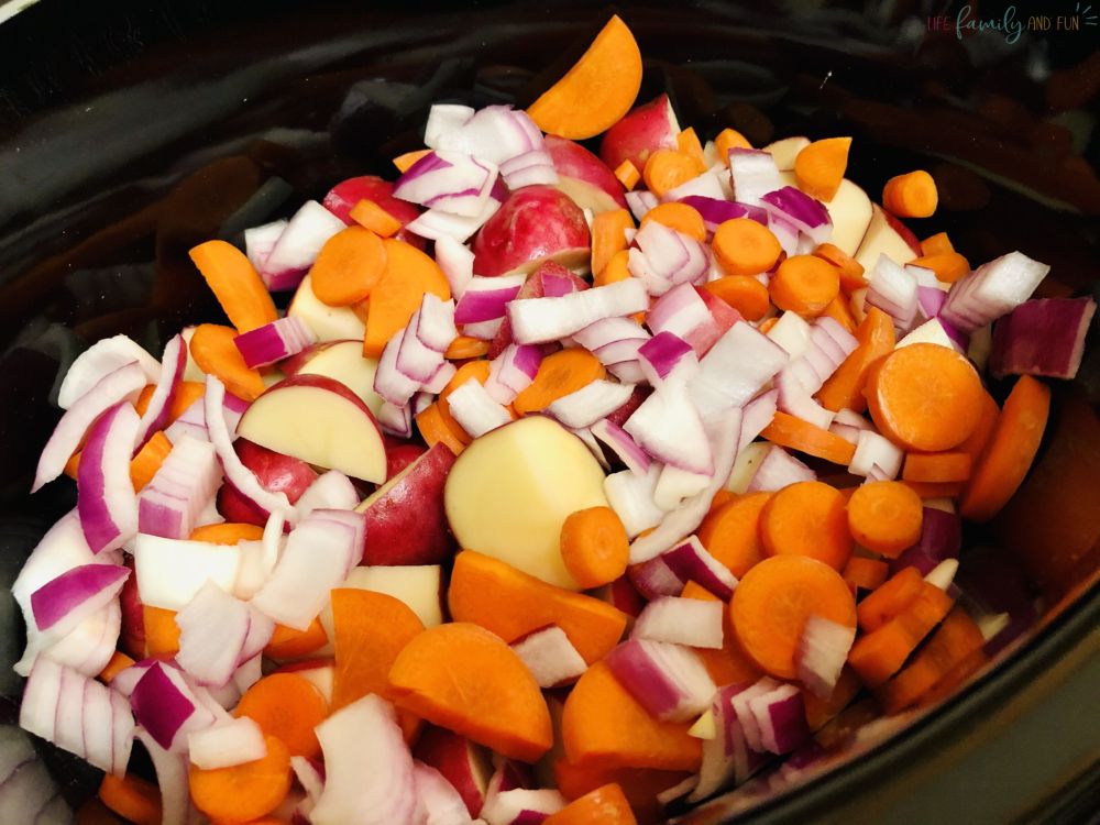 raw chopped veggies in pot