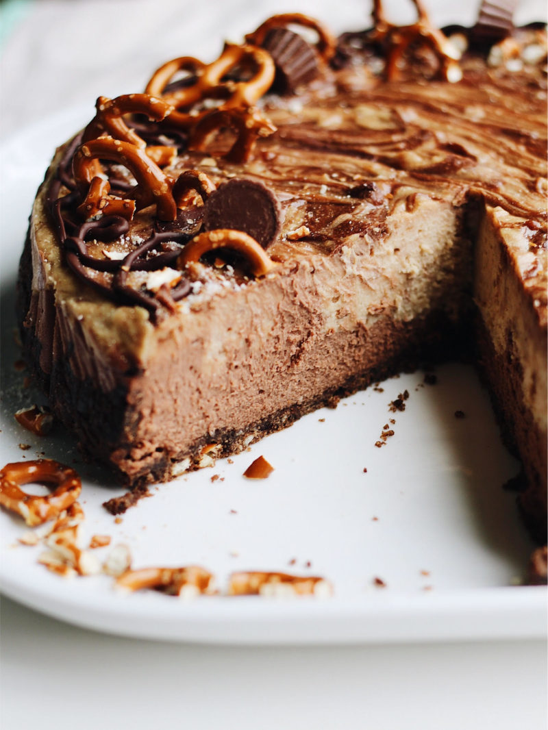 Sweet and Salty Pretzel Peanut Butter Chocolate Cheesecake